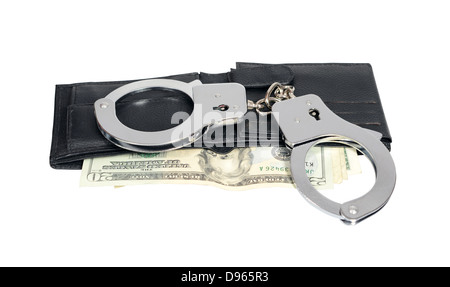 Dollars and handcuffs Stock Photo