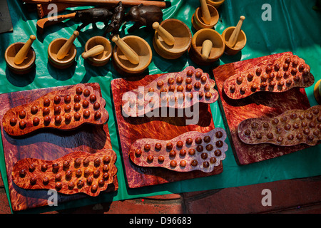 Wooden foot massage for sale in Sampeng  market, Bangkok, an endless sprawl of stalls Stock Photo