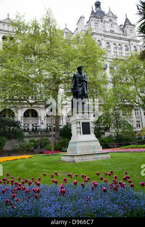 Whitehall Gardens on Victoria Embankment with Willian Tyndale Statue - London UK Stock Photo