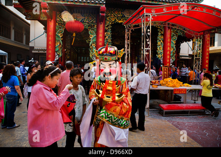 Festivities outside Wat Mangkon temple during Chinese New Year in Bangkok Stock Photo