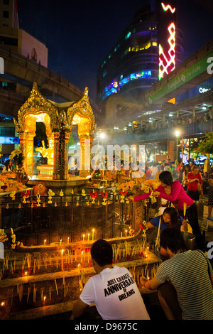 Worshipers in the Erawan Shrine, Bangkok. Stock Photo