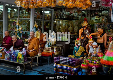 Assorted religious figures for sale, Bangkok, Thailand Stock Photo
