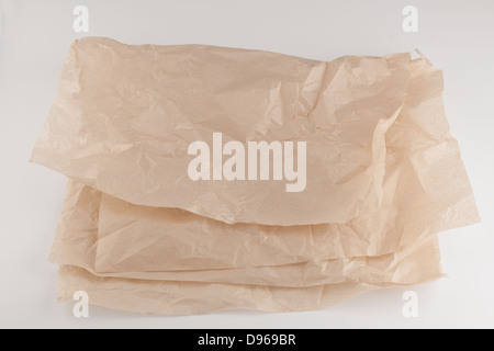 Two thin light sheets of folded brown packing paper Stock Photo