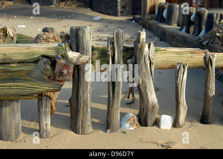 Beach detail, timber breakers on a Norfolk Beach near Hunstanton. Stock Photo