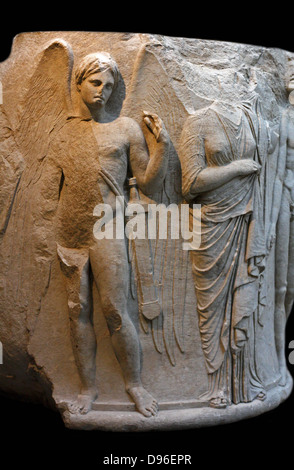 Sculpted marble column drum. Circa 325-300 BC. Found in Ephesus at the temple of Artemis. This view shows a youthful winged Thanatos (death), a draped woman (possibly Alcestis or Eurydice). Stock Photo