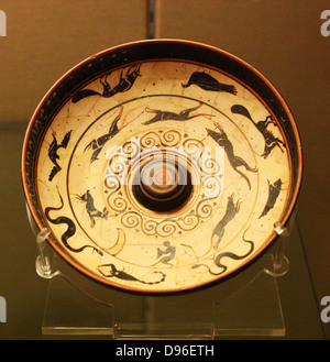 Offering-dish, or 'Phiale' decorated with a black-figure and white-ground. Also featuring friezes of a hare hunt, birds and animals. Athens, circa 500-470 BC. Stock Photo