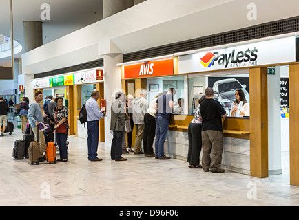 People hiring a car, Avis car rental desk, Zurich airport ...