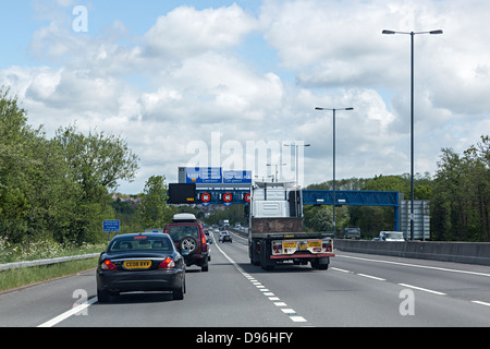 Traffic on the motorway M4 approaching the tunnel at Malpas at Newport, Wales, UK Stock Photo