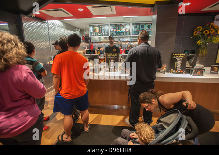 Burger lovers from far and wide descend on the new Fatburger restaurant in the Murray Hill neighborhood of New York Stock Photo