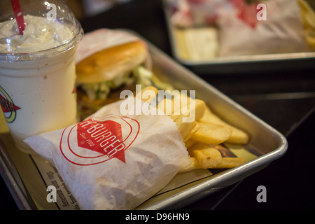 Burger lovers from far and wide descend on the new Fatburger restaurant in the Murray Hill neighborhood of New York Stock Photo