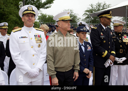 The 35th Commandant of the Marine Corps, Gen. James F. Amos, center, and the Chief of Naval Operations, Adm. Jonathan W. Greenert, left, attend the 44th annual Explosive Ordnance Disposal (EOD) Memorial Ceremony outside the Kauffman EOD Training Complex i Stock Photo