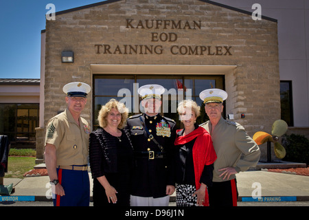 The 35th Commandant of the Marine Corps, Gen. James F. Amos, right; Marine Corps First Lady Bonnie Amos, second from right; and Stock Photo