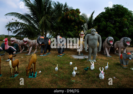 Plaster animals for sale in a roadside shop, Along Veng, Angkor temple complex, Thailand Stock Photo