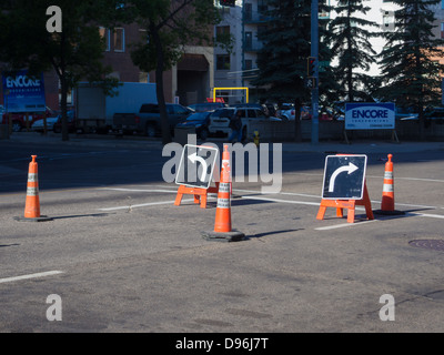 road signs with left turn and right turn arrows Stock Photo