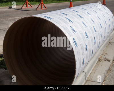 concrete pouring tube at construction site Stock Photo