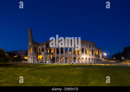 facade of the Colosseum or Coliseum at night, Rome, Italy Stock Photo