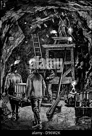 Workers in underground galleries putting cartridges of dynamite into position in preparation for the blowing up Flood Rock, part of the Hell Gate Rocks complex which prevented large vessels reaching New York Harbour, and presented a hazard to smaller ones. Dynamite was the explosive used. From 'The Illustrated London News', 1885. Wood engraving. Stock Photo