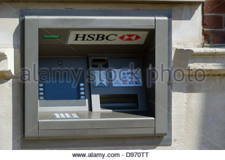 HSBC bank atm cash machine in wall British banking UK Stock Photo ...