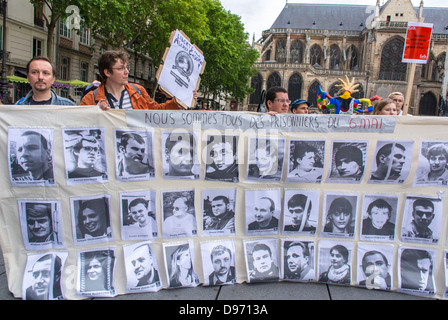 Paris, France, Group human rights activists  Holding French protest poster at Demonstration Opposing Russian Government Political Oppression, by Amnesty International,