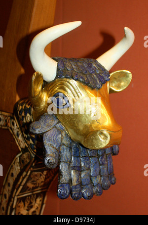 The Queen's Lyre. This lyre was found in the tomb of the Queen Puabi. The lapis lazuli, shell and red limestone decoration and the head of the bull are original. The wooden parts, pegs and strings and bull's horns are modern reconstruction. The bull's head is covered with gold. The eyes are lapis lazuli and shell. Stock Photo