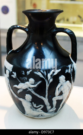 The Portland Vase. Cameo glass, probably made in Rome About 15BC - AD 25. The Portland Vase is one of the finest surviving pieces Roman glass, and is named after the Duke of Portland who owned it from 1785 to 1945. It made of cameo glass a technique in which vessels and plaques, sometimes free-blown, sometimes cast, are created with two layers of glass. The outer layer (usually white) is carved away from the underlying dark layer (usually blue) to create decorative scenes and patterns. Stock Photo