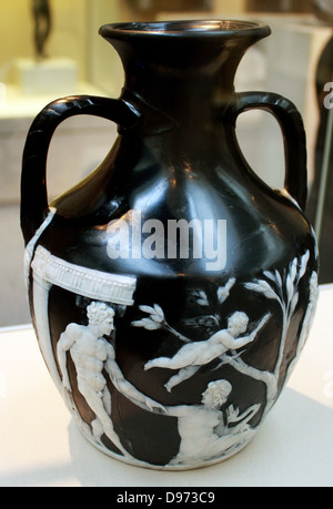 The Portland Vase. Cameo glass, probably made in Rome About 15BC - AD 25. The Portland Vase is one of the finest surviving pieces Roman glass, and is named after the Duke of Portland who owned it from 1785 to 1945. It made of cameo glass a technique in which vessels and plaques, sometimes free-blown, sometimes cast, are created with two layers of glass. The outer layer (usually white) is carved away from the underlying dark layer (usually blue) to create decorative scenes and patterns. Stock Photo