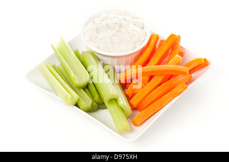 Ranch dressing with fresh carrots and celery Stock Photo