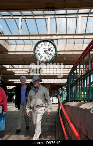 People walking on platform at Carnforth Railway Station Lancashire England UK United Kingdom GB Great Britain. Location of Brief Encounter 1945 film Stock Photo