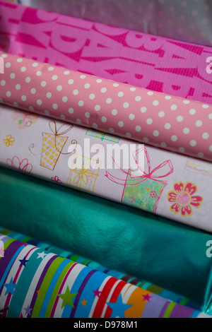 A pile of wrapped girls birthday presents Stock Photo