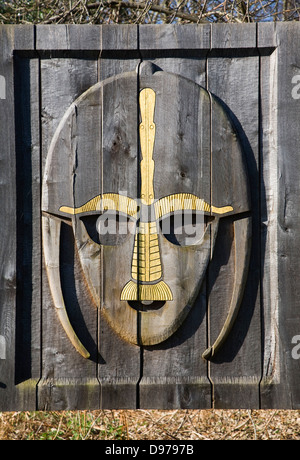 Saxon helmet entrance sign at Sutton Hoo Anglo-Saxon burial site, near Woodbridge, Suffolk, England Stock Photo