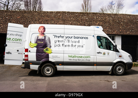 Waitrose Home Delivery van at customer's premises Stock Photo