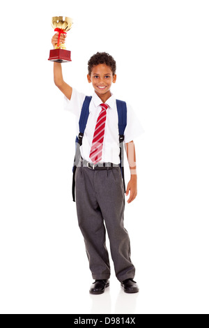 cute elementary schoolboy holding a trophy isolated on white Stock Photo