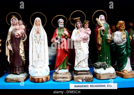 Religious souvenirs in shop window, Madrid , Spain Stock Photo