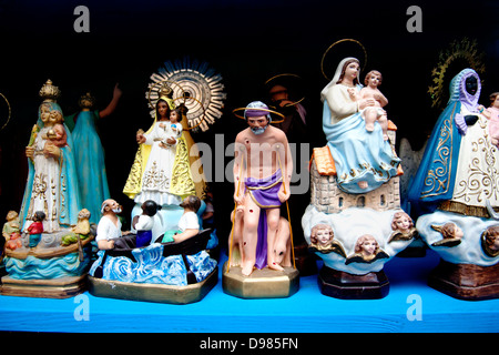 Religious souvenirs in shop window, Madrid , Spain Stock Photo