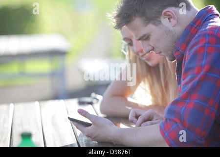 a young couple looking at a tablet pc Stock Photo