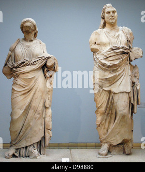 Colossal statue of a man and woman from the Mausoleum at Halikarnassos, Greek, around 350 BC From modern Bodrum, south-western Turkey. Traditionally identified as Maussollos, of the Hekatomnid dynasty. This is the best preserved of the colossal dynastic figures from the Mausoleum, even though it has been reconstructed from at least seventy-seven fragments. Stock Photo