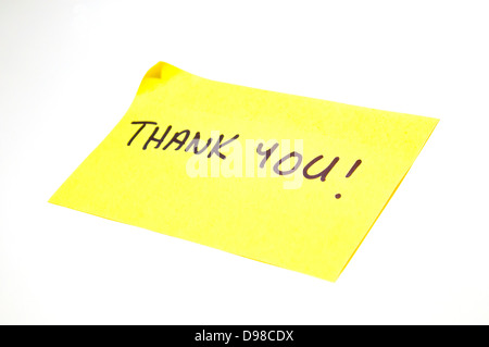 'Thank You!' written on a yellow sticky note. Stock Photo