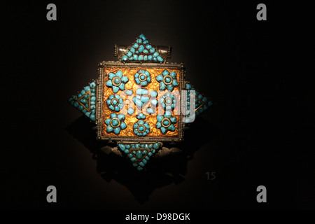 Reliquary locket (gau), 1800s, Tibet, tin, turquoise stone.  The locket once contained written prayers which had a protective function. Stock Photo