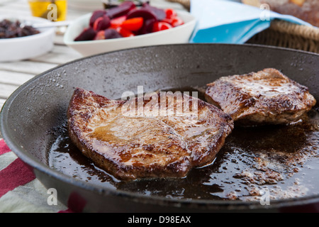 Steak In Frying Pan, London, UK Stock Photo