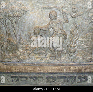 17th Century Dutch plaque from a house in Amsterdam depicting the Biblical account of Abraham preparing to sacrifice his son Isaac. Stock Photo