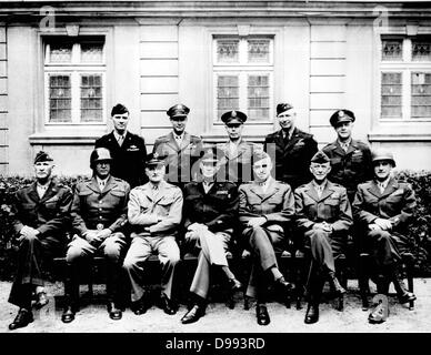 Senior American military officers during World War II. Seated (left to right) Generals William H. Simpson, George S. Patton, Carl A. Spaatz, Dwight D. Eisenhower, Omar Bradley, Courtney H. Hodges, and Leonard T. Gerow; standing (from left to right) Ralph Stock Photo