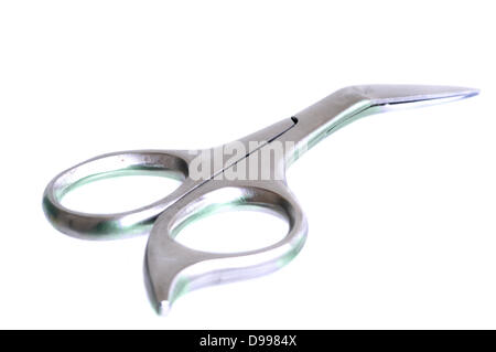 Small scissors isolated on white Stock Photo