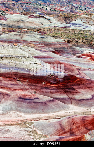 Overnight rainfall enriches colorful volcanic ash deposits at the Bentonite Hills in Utah's Capitol Reef National Park. Stock Photo