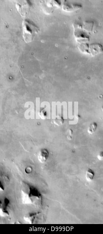 This pair of THEMIS infrared images shows the so-called 'face on Mars' landform viewed during both the day and night. Stock Photo