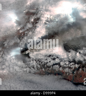 Images of Iceland's Eyjafyallajökull volcano on May 3, 2010. Figure 1 is a visible image and Figure 2 is in infared. Satellite image. Stock Photo