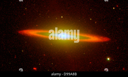 The Sombrero galaxy is located some 28 million light years away. Viewed from Earth, it is just six degrees south of its equatorial plane. Spitzer detected infrared emission not only from the ring, but from the center of the galaxy too, where there is a huge black hole, believed to be a billion times more massive than our Sun. Stock Photo