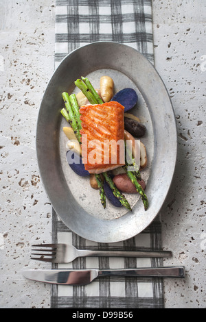 pan seared salmon with asparagus and small red potatoes Stock Photo