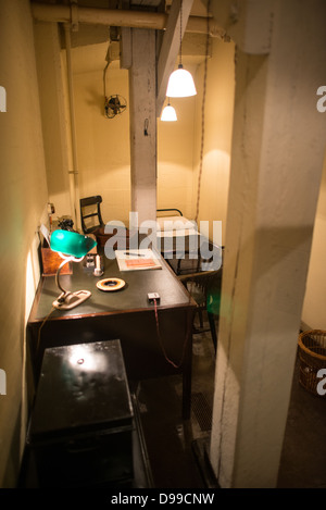 Churchill War Rooms Private Secretary Office London | LONDON, United Kingdom — Room 61A Left, the private secretary's office, at the Churchill War Rooms in London. The museum, one of five branches of the Imperial War Museums, preserves the World War II underground command bunker used by British Prime Minister Winston Churchill. Its cramped quarters were constructed from converting a storage basement in the Treasury Building in Whitehall, London. Being underground, and under an unusually sturdy building, the Cabinet War Rooms were afforded some protection from the bombs falling above during the Stock Photo