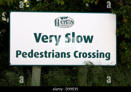 Very Slow Pedestrians Crossing sign Stock Photo