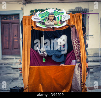 A street puppeteer in Florence, Italy Stock Photo
